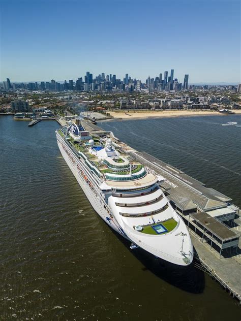 Aerial Vertical Shot of Cruise Ship in Port Melbourne with City Skyline ...