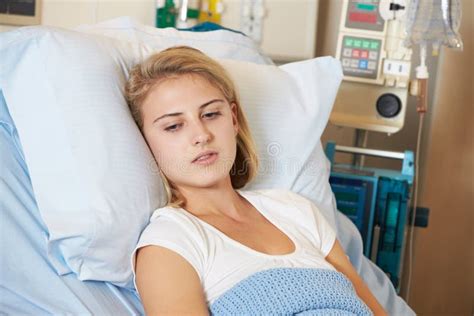 Depressed Teenage Female Patient Lying in Hospital Bed Stock Image - Image of teen, illness ...