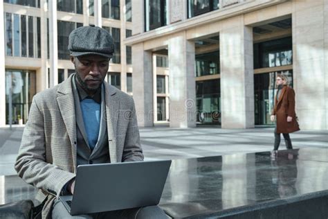 Businessman Working on Laptop Outdoors Stock Image - Image of entrepreneur, lifestyles: 219758151