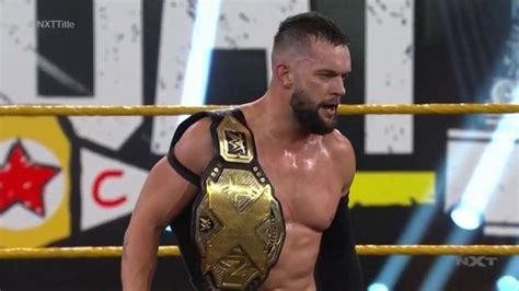 Finn Balor reacts after winning the NXT Championship