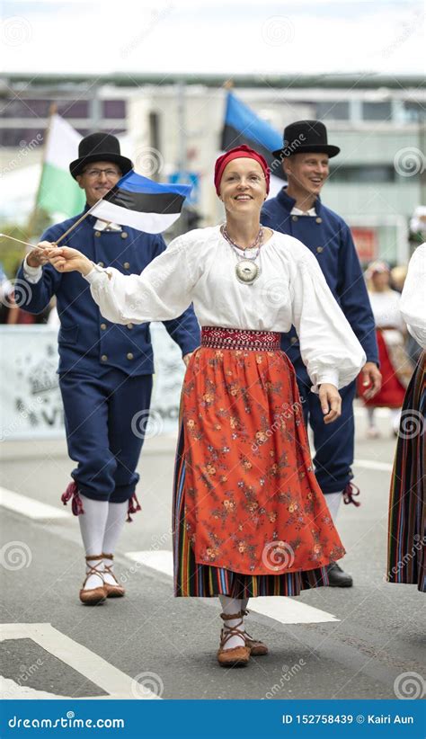 Estonian People in Traditional Clothing Walking the Streets of Tallinn ...