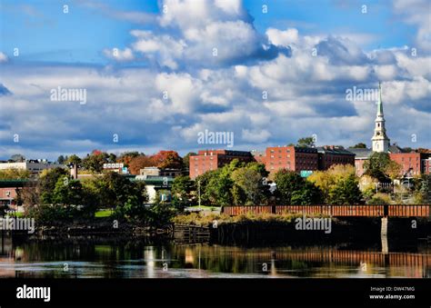 Bangor Maine from river panoramic with church and skyline in Northern New England in fall colors ...