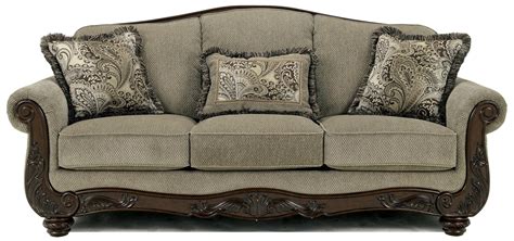 Signature Design by Ashley Martinsburg - Meadow Traditional Camel Back Sofa with Exposed Wood ...