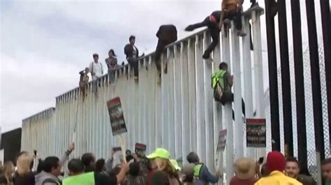 Video 'Caravan' of migrants turned away by US border patrol - ABC News