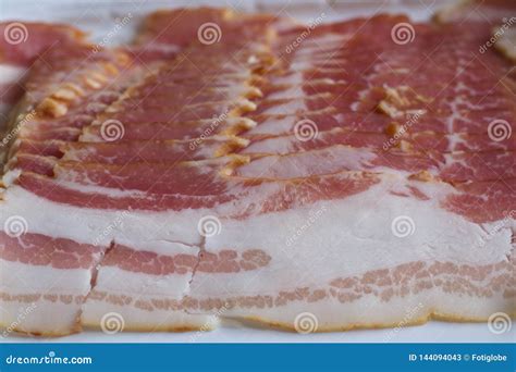 Raw bacon slices stock image. Image of portion, delicious - 144094043