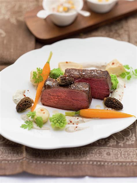 Chateaubriand With Morel Mushrooms And Spring Vegetables Photograph by Eising Studio - Fine Art ...