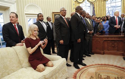 Kellyanne Conway kneels on Oval Office couch, sparks debate