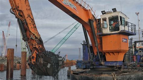 Barge mounted Demag Dredging Harbour - YouTube