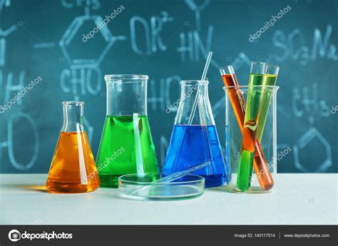 Test beakers and flasks Stock Photo by ©belchonock 140117514