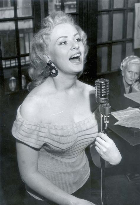 Actress And Fifties Glamour Model Sabrina (norma Ann Sykes) Pictured Singing. - Flashbak