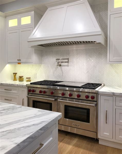 Thassos White marble herringbone kitchen backsplash