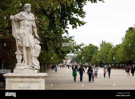 Visitors in Tuileries Garden, Jardin des Tuileries with a ancient ...