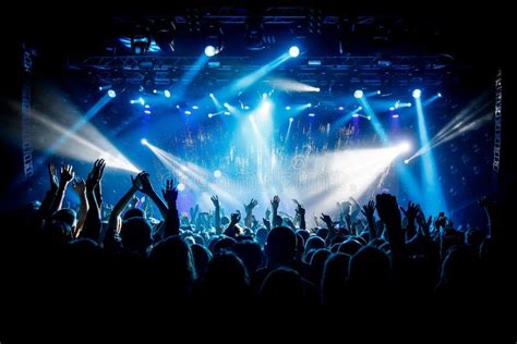 A Lot of Hands, Crowd on Concert, Blue Light Stock Image - Image of blue, concert: 144443483