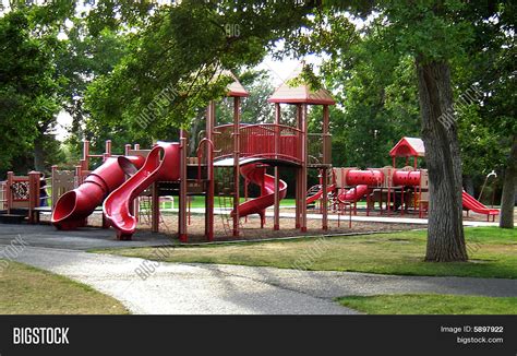 Red Playground Equipment Green Park Image & Photo | Bigstock