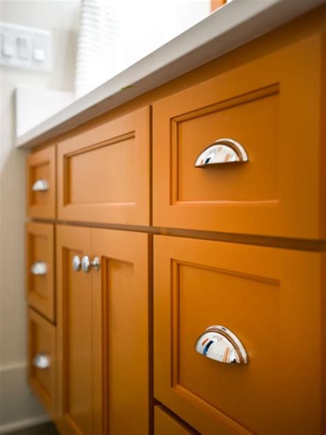 Would you dare to paint your cabinets pumpkin spice orange? See this ...