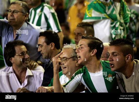 Real Betis supporter nsulting opposing players Stock Photo - Alamy