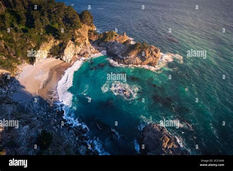 Aerial View of McWay Falls and Cove Beach in BIg Sur, California. McWay ...