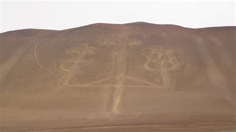 Tourists trample over protected Peruvian hill carving