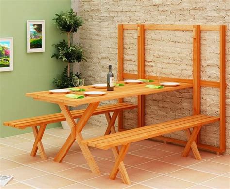 This Wall Mounted Folding Picnic Table Saves Tons Of Space When Not In Use