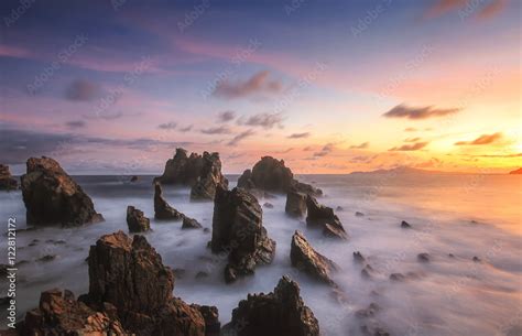 Amazing stones at beach in sunset. Locations in Pegadung Beach Lampung ...