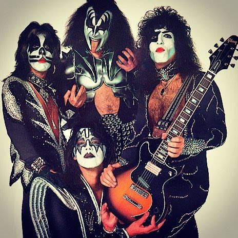 KISS Band in Iconic Face Paint and Black Outfits