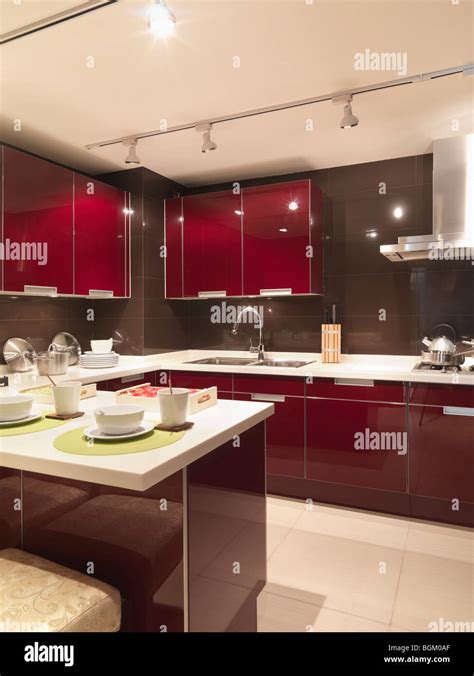 Modern red kitchen Stock Photo - Alamy