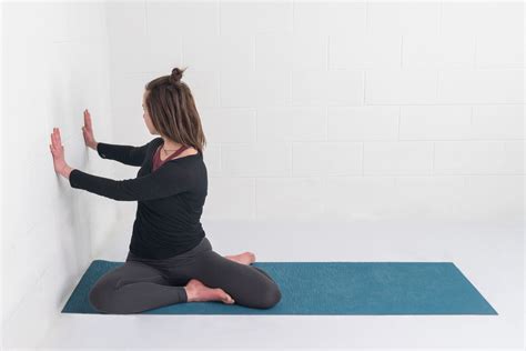 Mindful Twisting: Seated Spinal Twist Pose at the Wall - YogaUOnline