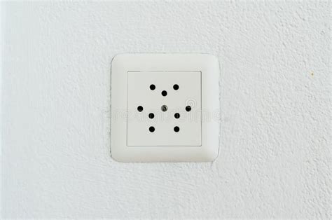 Socket for Swiss Plug Close Up on a White Wall Stock Image - Image of ...