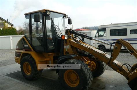 CAT 906 2002 Wheeled loader Construction Equipment Photo and Specs