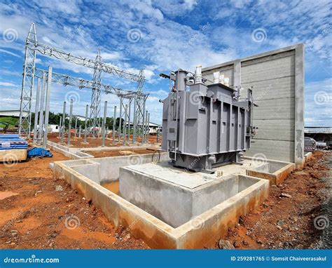 Main Tank Power Transformer Installation, the High Voltage Take-off Tower, and Foundation for ...