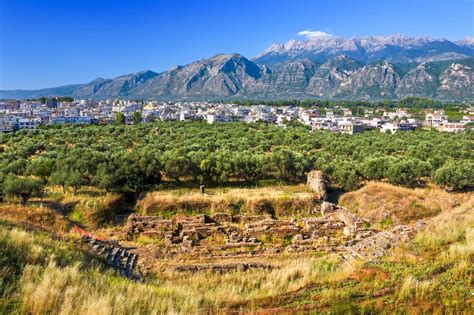 Sparta meets Sparta - The ruins of ancient Sparta next to the modern ...