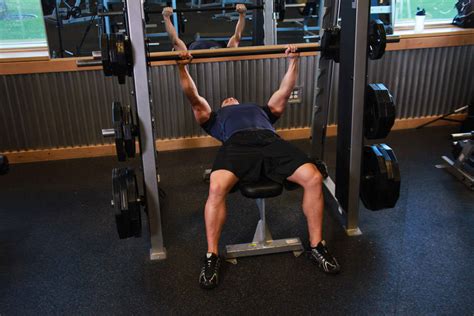 Smith Machine Bench Press Exercise Guide and Video