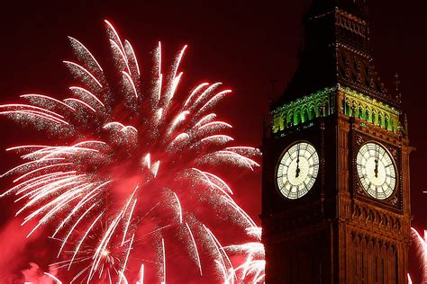 Fireworks explode behind the Houses of Parliament and Big Ben on the ...