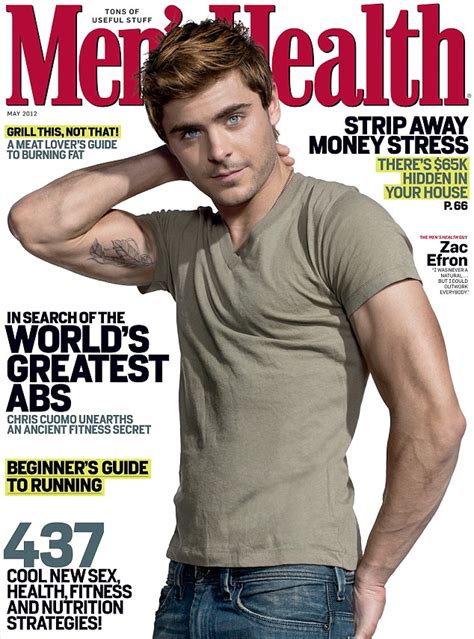 Zac Efron shows off his touched-up feather tattoo on his incredibly muscular right bicep on Men ...