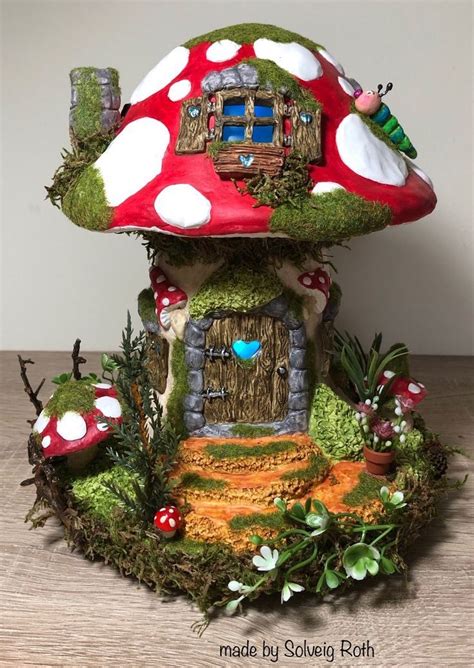 a mushroom house is sitting on the table