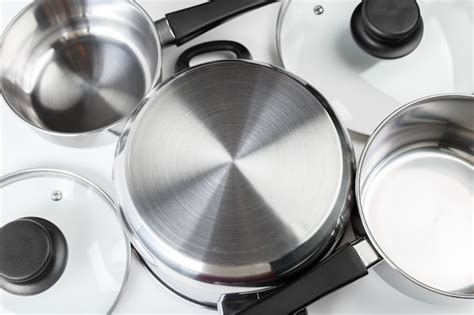 Premium Photo | Stainless steel pots and pans isolated