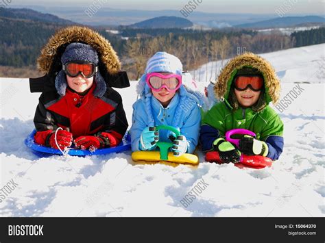 Kids Playing Snow Image & Photo (Free Trial) | Bigstock