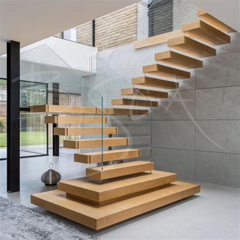 the stairs are made of wood and glass