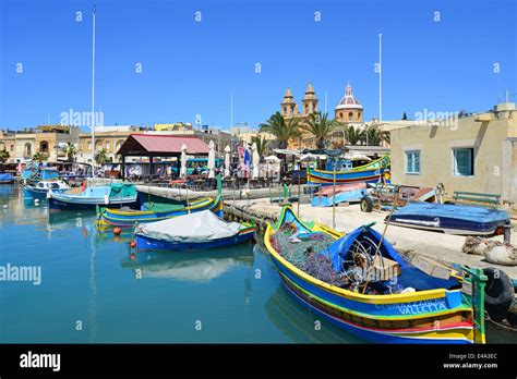 Luzzu boats in Marsaxlokk Harbour, Marsaxlokk, South Eastern District, Malta Xlokk Region ...