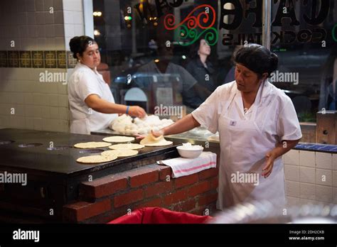 Women make hand made tortillas at the Old Town Mexican Cafe, Old Town ...