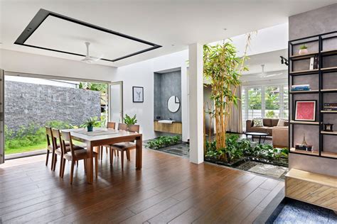 The living room merges with the dining area, which further opens out ...