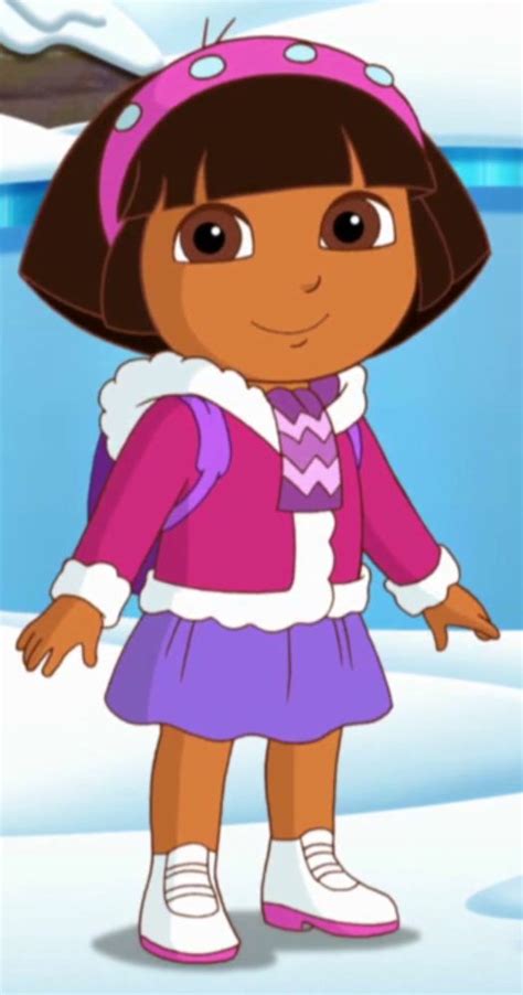 dora the explorer is standing in the snow