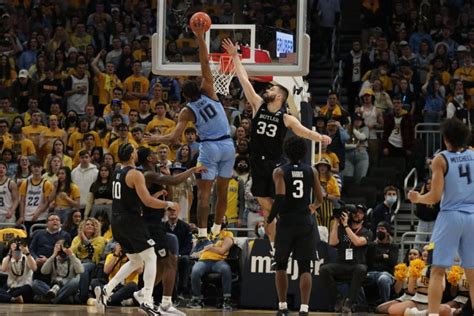 Late heroics and relentless defense lead to National Marquette Day ...