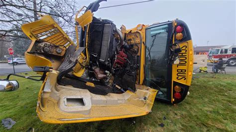 School Bus Rolls Over After Demolishing Stolen BMW In Crash