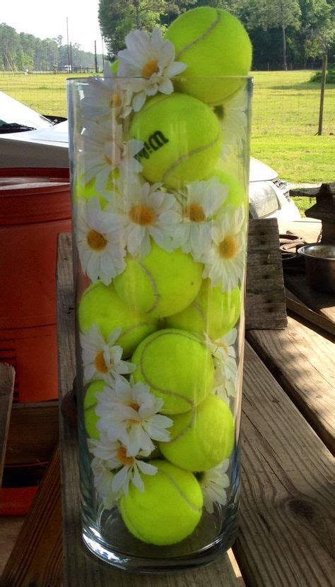 Such a beautiful centerpiece for a tennis-themed party! Check out more tennis ideas at # ...