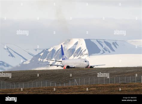 Commercial airplane taking off at the Longyearbyen airport Svalbard ...