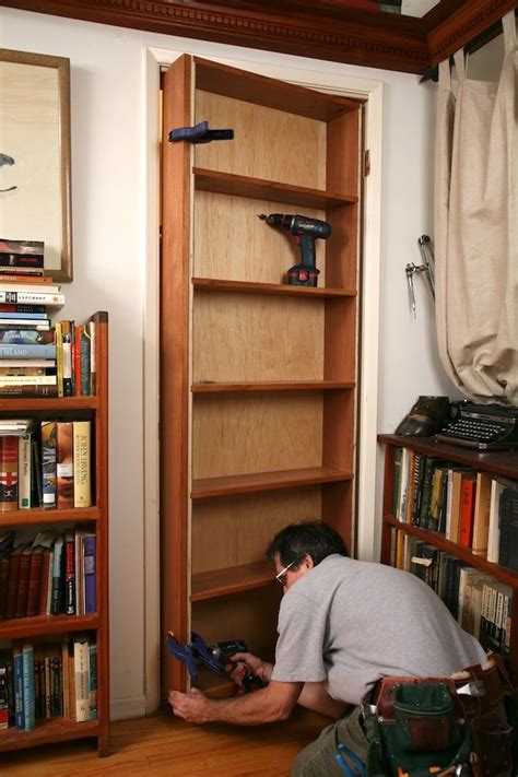 Hidden Pivot Bookcase Installation | THISisCarpentry | Hidden door ...