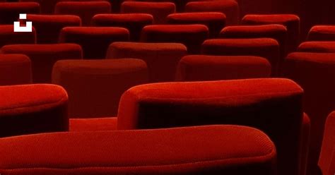 A row of red seats in a theater photo – Free Theater Image on Unsplash