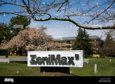 A logo sign outside of the headquarters of ZeniMax Media, parent ...