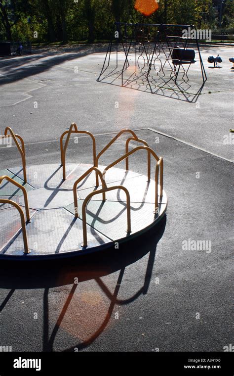 roundabout in a children's playground Stock Photo - Alamy